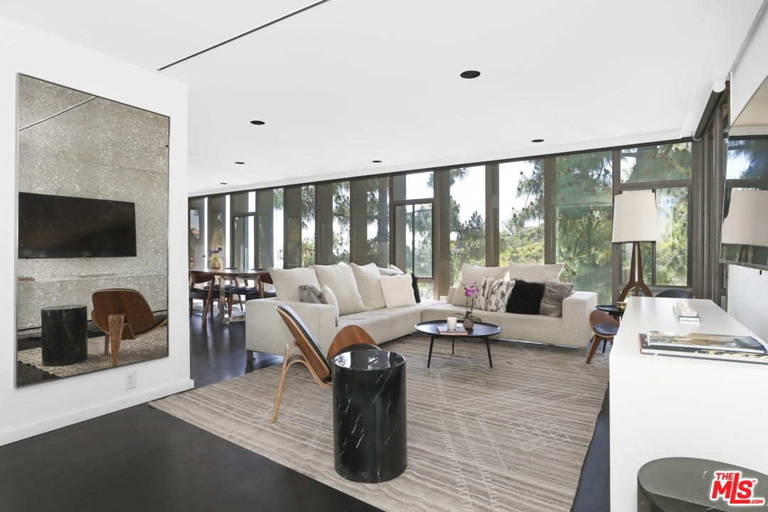 2867 Belden Drive Los Angeles, CA 90068 - Photo 23 of 54 a living room with fireplace furniture and a flat screen tv