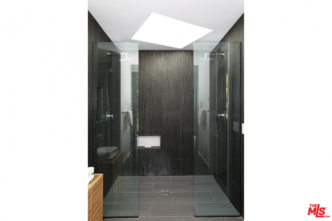 2867 Belden Drive Los Angeles, CA 90068 - Photo 36 of 54 a bathroom with a sink and a mirror