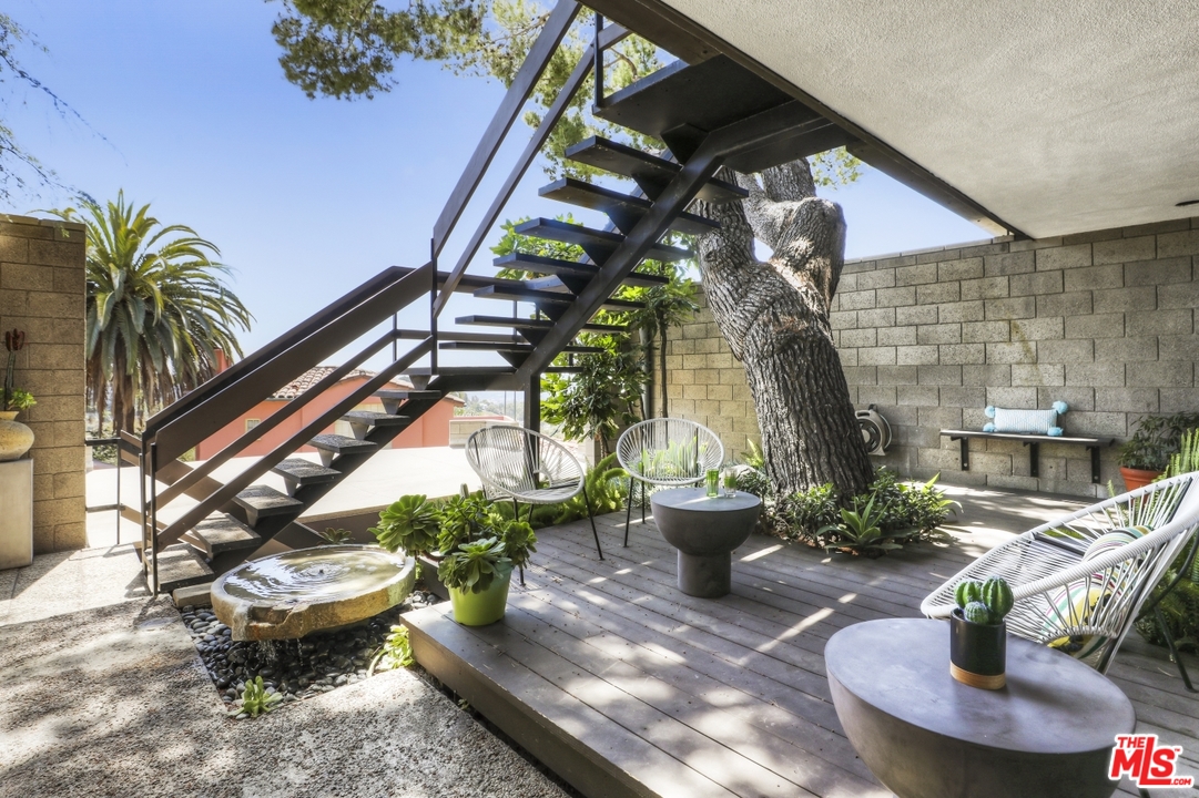 2867 Belden Drive Los Angeles, CA 90068 - Photo 41 of 54 a view of a backyard with plants and outdoor seating