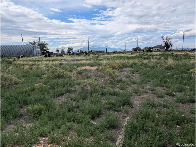 an aerial view of residential house with outdoor space