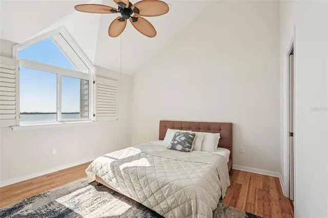 a front view of a house with a yard table and chairs