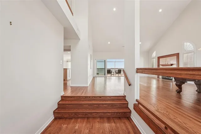 a living room with a fireplace and a window