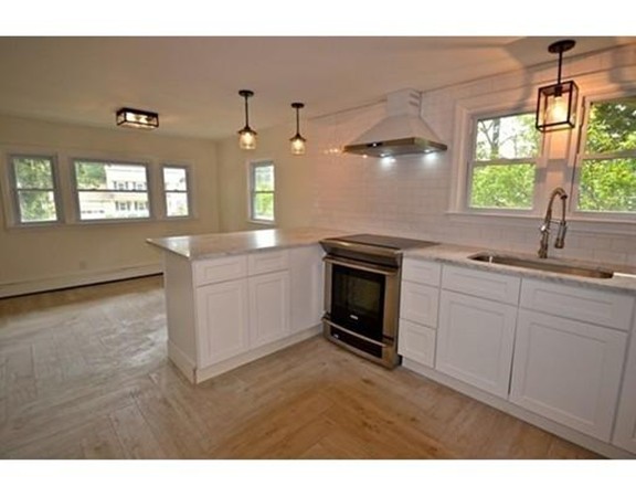 532 Delano Road Marion, MA 02738 - Photo 13 of 27 a kitchen with a sink cabinets and window