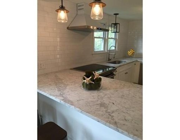 532 Delano Road Marion, MA 02738 - Photo 8 of 27 a kitchen with a sink and a stove