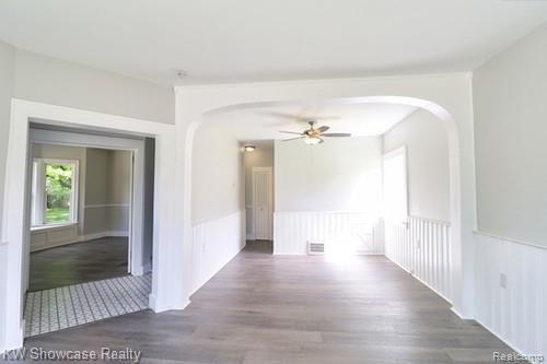 151 East Ruggles Highland, MI 48357 - Photo 5 of 36 Living room/dining room which can easily be converted to a first floor master bedroom