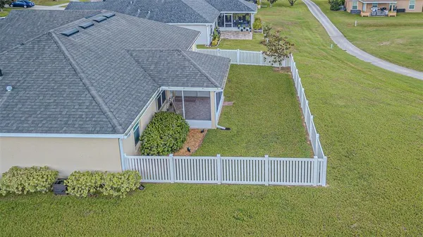 an aerial view of a house having swimming pool
