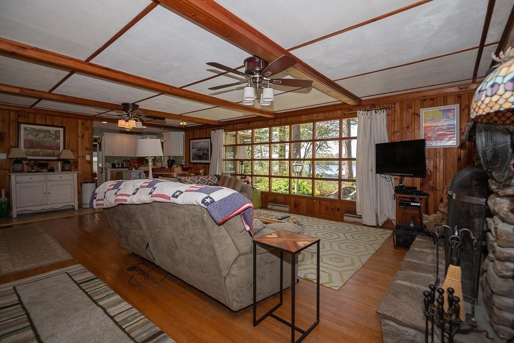 3 Lakeview Road Webster, MA 01570 - Photo 12 of 40 a bed room with furniture and a flat screen tv