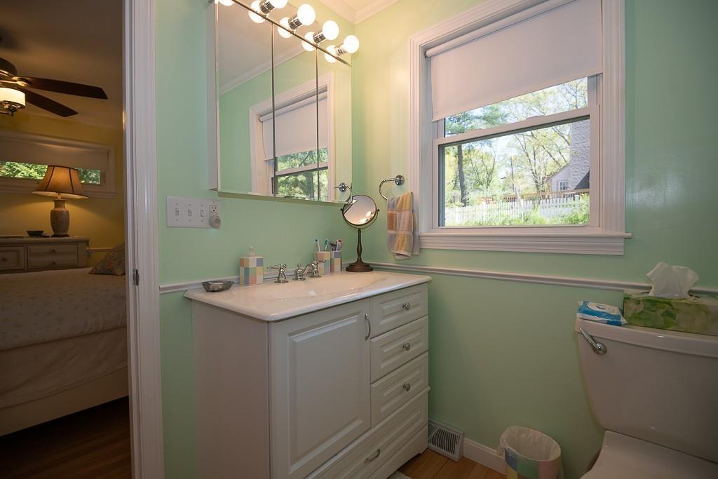 3 Lakeview Road Webster, MA 01570 - Photo 17 of 40 a bathroom with a granite countertop sink toilet and mirror