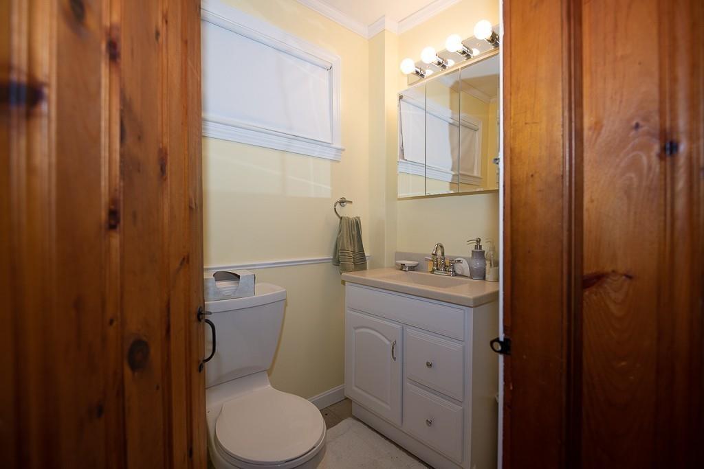 3 Lakeview Road Webster, MA 01570 - Photo 21 of 40 a bathroom with a granite countertop toilet sink and mirror