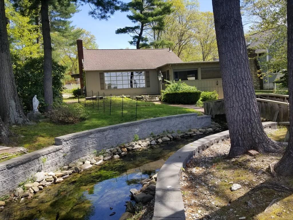 3 Lakeview Road Webster, MA 01570 - Photo 26 of 40 a front view of a house with a yard