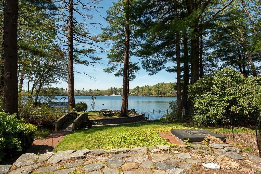 3 Lakeview Road Webster, MA 01570 - Photo 28 of 40 a view of a lake with a patio