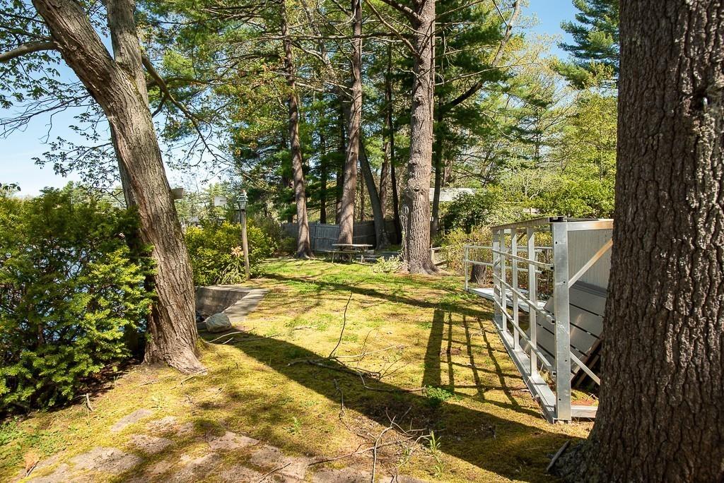 3 Lakeview Road Webster, MA 01570 - Photo 34 of 40 a view of swimming pool with large trees and plants