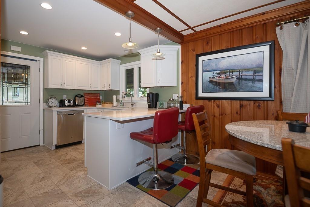 3 Lakeview Road Webster, MA 01570 - Photo 9 of 40 a kitchen with a sink cabinets and window