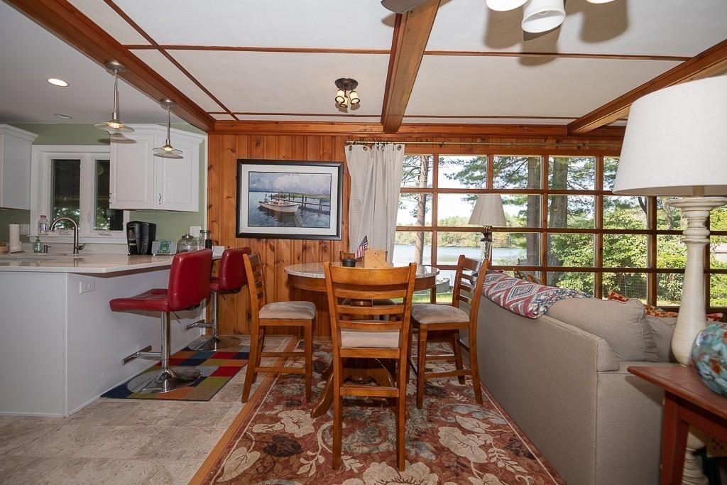 3 Lakeview Road Webster, MA 01570 - Photo 10 of 40 a living room with furniture a rug and a large window