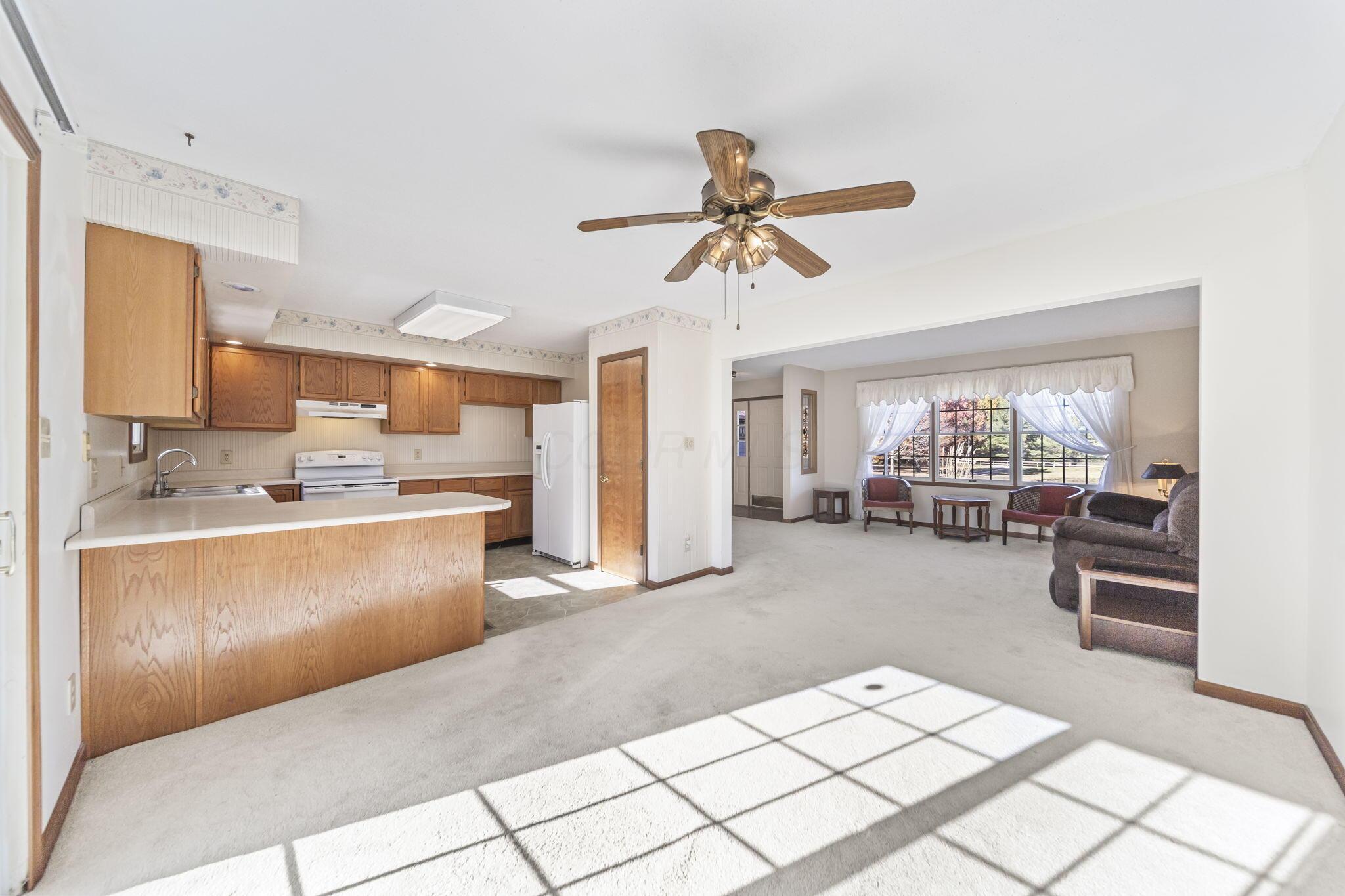 9791 Jug St Road Northwest Pataskala, OH 43062 - Photo 15 of 83 Sun-filled kitchen with eat-in area.