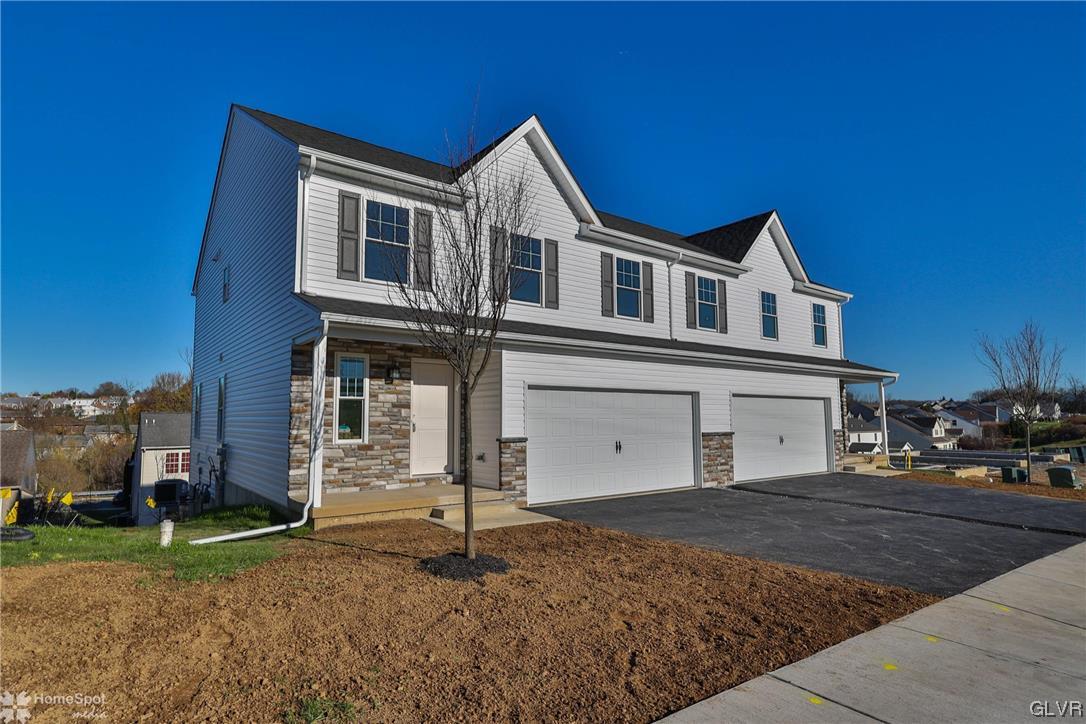 651 Sipos Drive Northampton, PA 18067 - Photo 2 of 47 a front view of a house with a yard