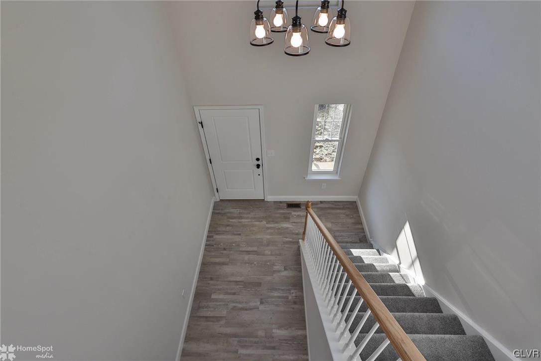 651 Sipos Drive Northampton, PA 18067 - Photo 24 of 47 a view of an entryway with wooden floor