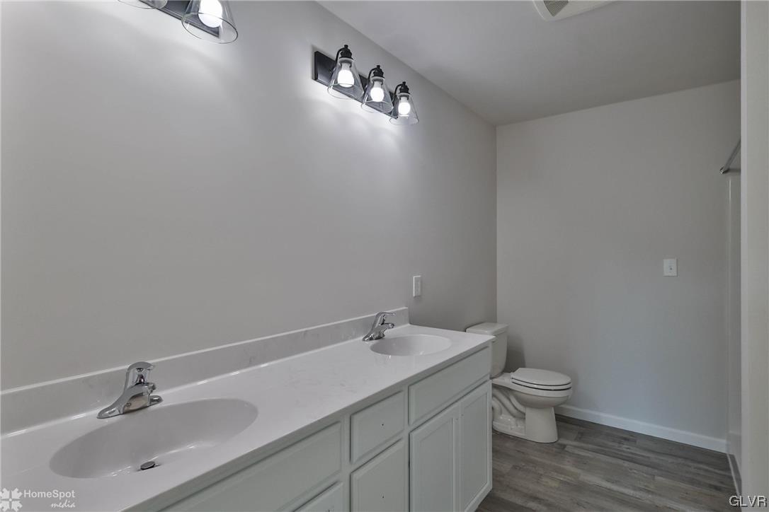 651 Sipos Drive Northampton, PA 18067 - Photo 35 of 47 a bathroom with a sink toilet and vanity