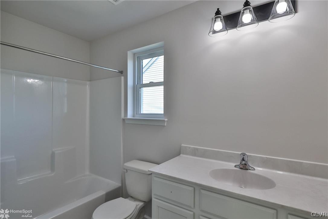 651 Sipos Drive Northampton, PA 18067 - Photo 38 of 47 a bathroom with a sink toilet and shower