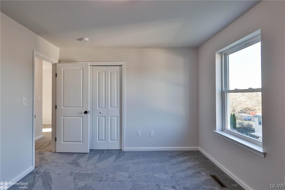 651 Sipos Drive Northampton, PA 18067 - Photo 43 of 47 a view of an empty room with window and closet area