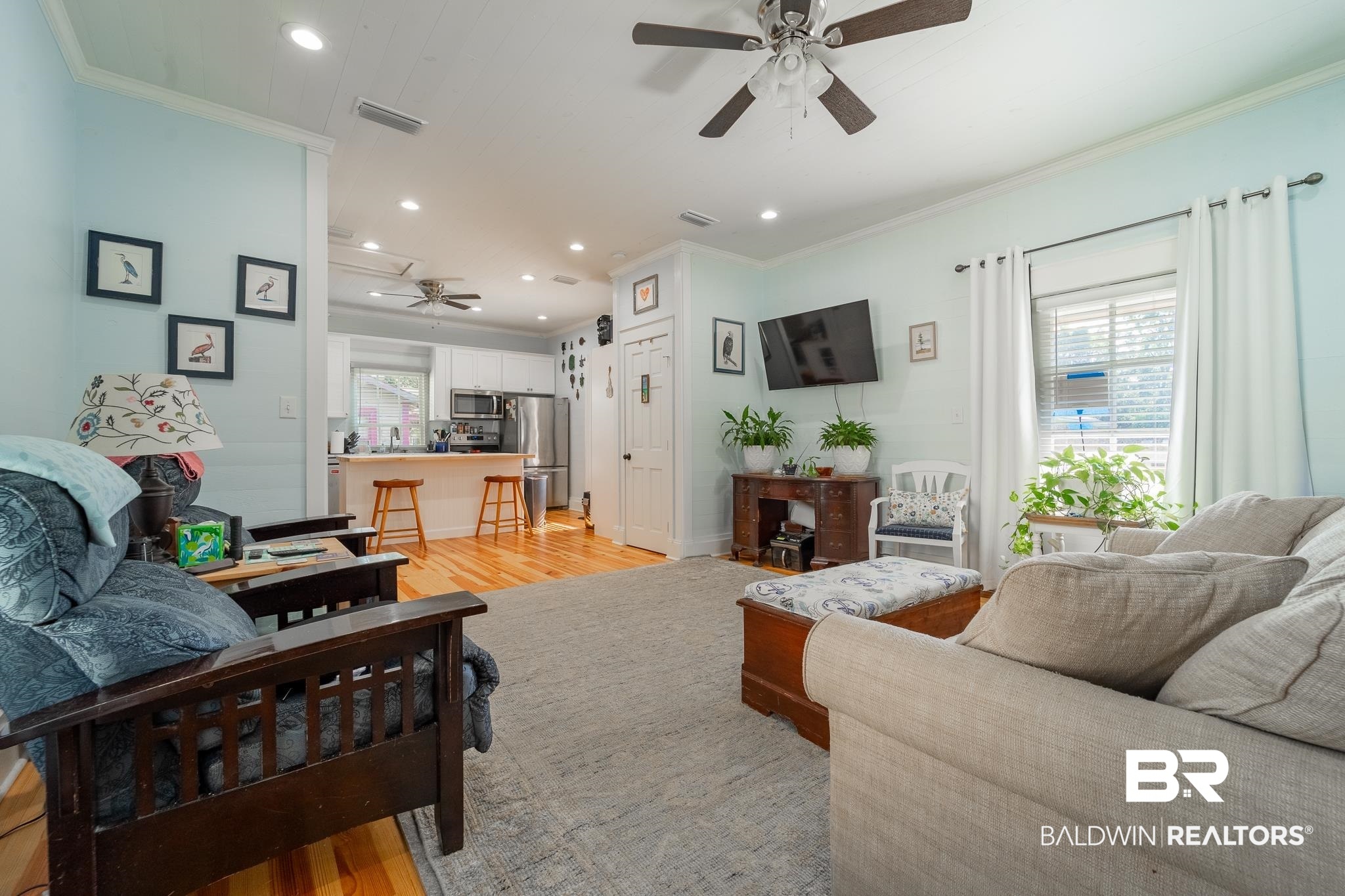 950 Texas Street Mobile, AL 36604 - Photo 4 of 17 Living room with ceiling fan, light hardwood / wood-style flooring, and ornamental molding