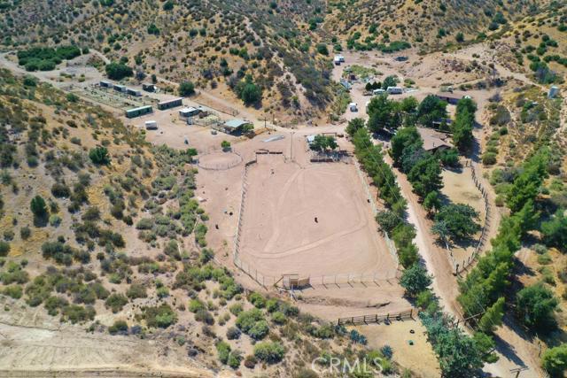 0 Dukes Country Road Hesperia, CA 92345 - Photo 6 of 15 a view of a dry yard with wooden fence