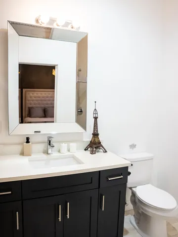 a bathroom with a sink and a toilet