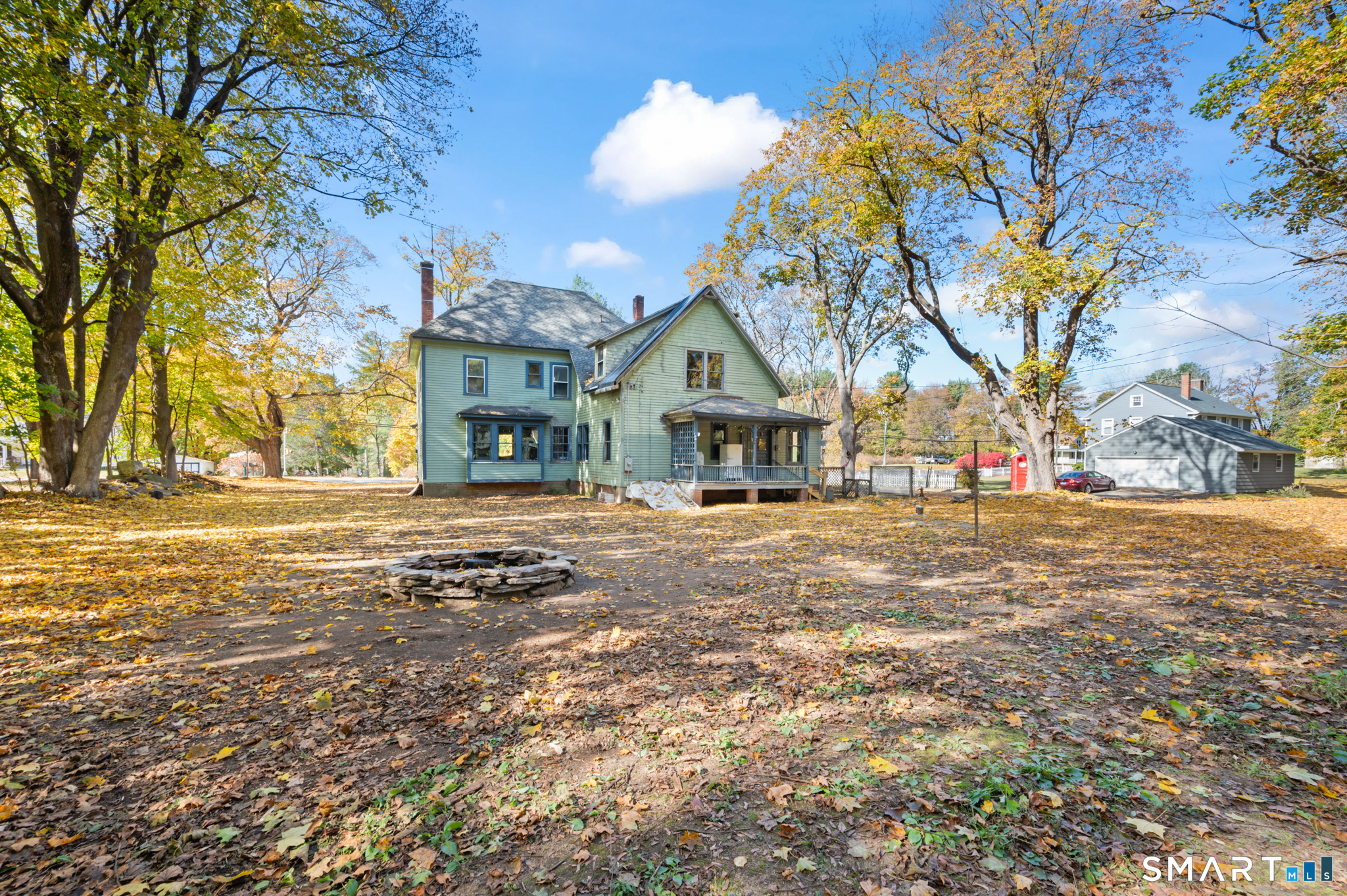 124 River Road Willington, CT 06279 - Photo 3 of 40 a front view of a house with a yard