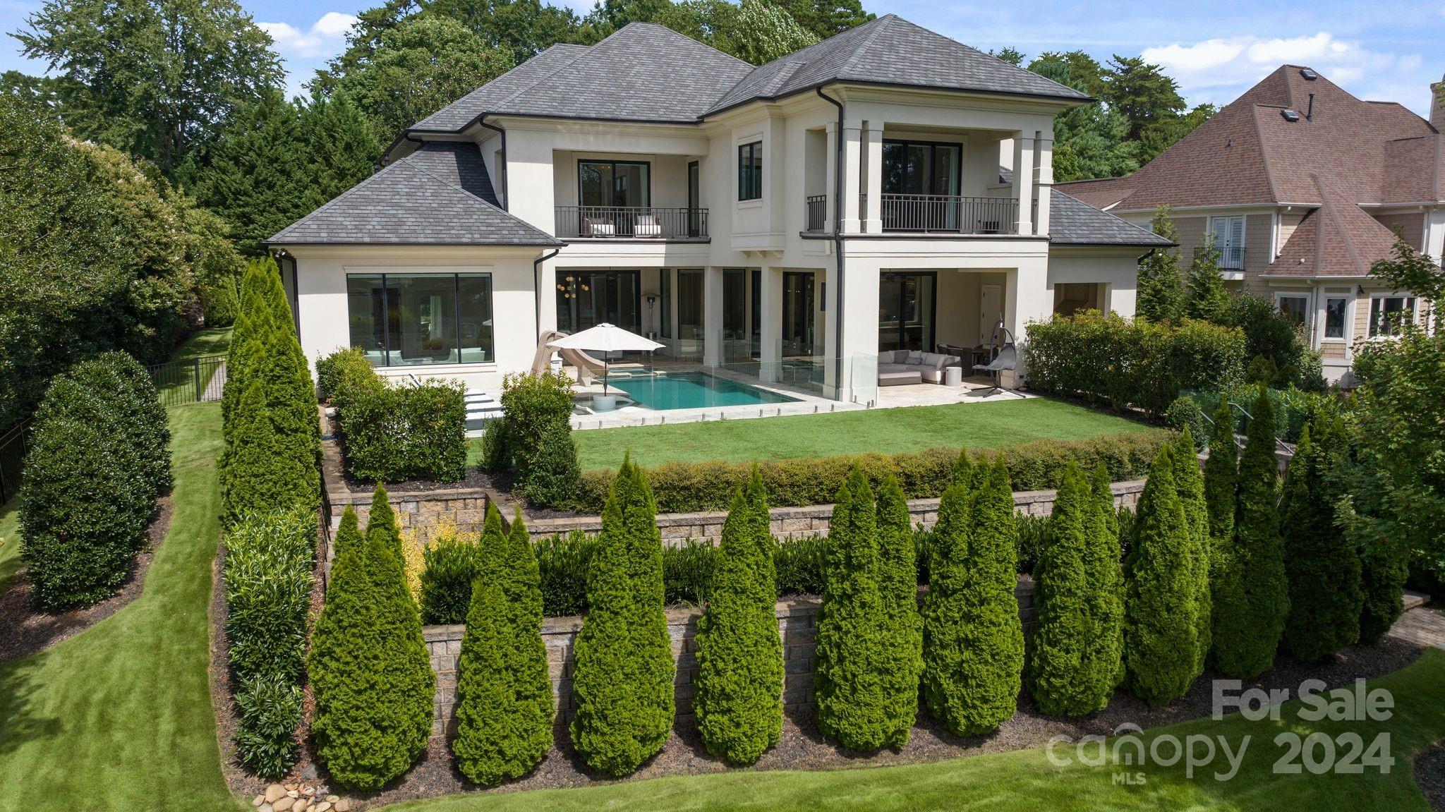 19004 Double Eagle Drive Cornelius, NC 28031 - Photo 11 of 48 a front view of a house with a yard