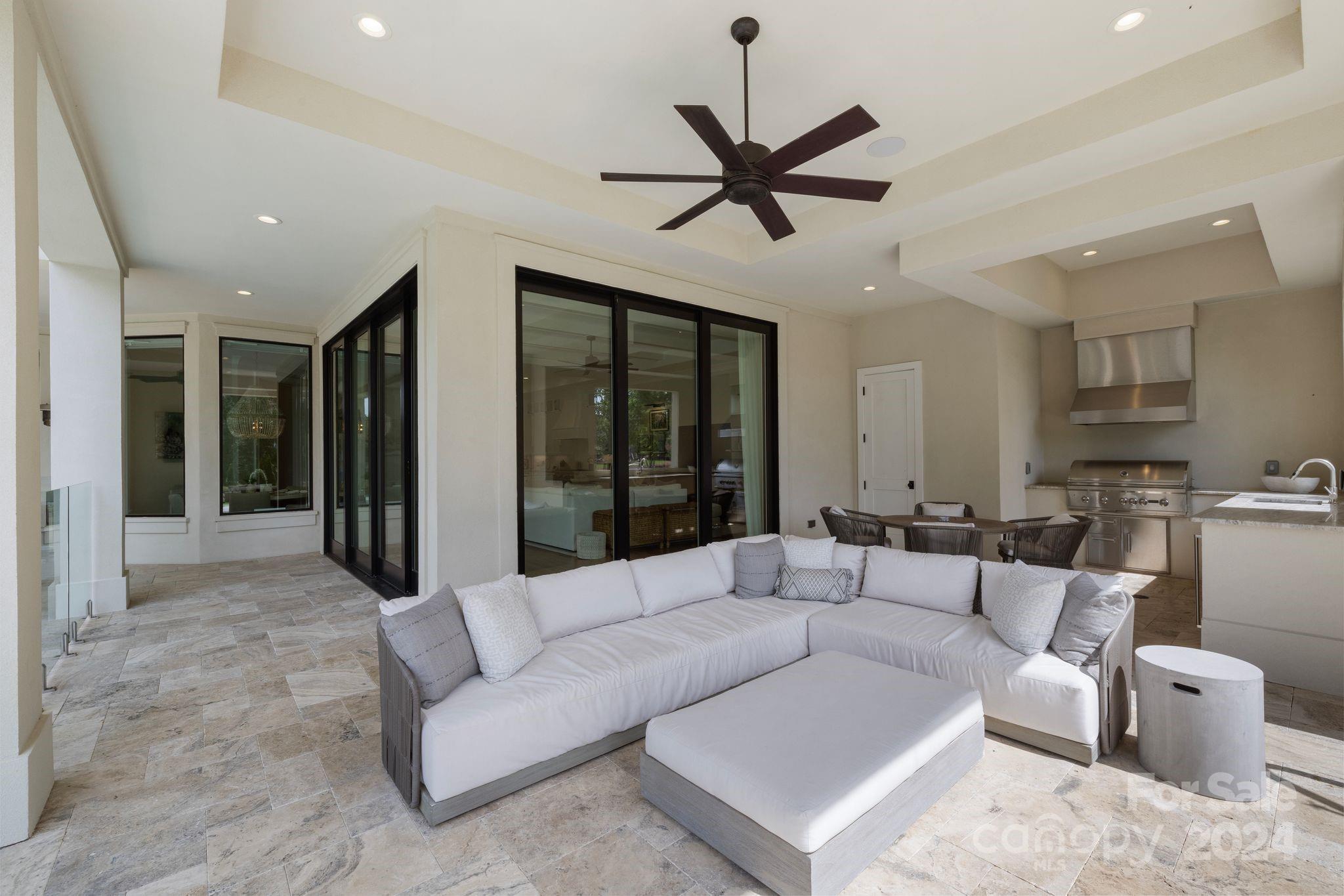 19004 Double Eagle Drive Cornelius, NC 28031 - Photo 17 of 48 a living room with furniture and a large window