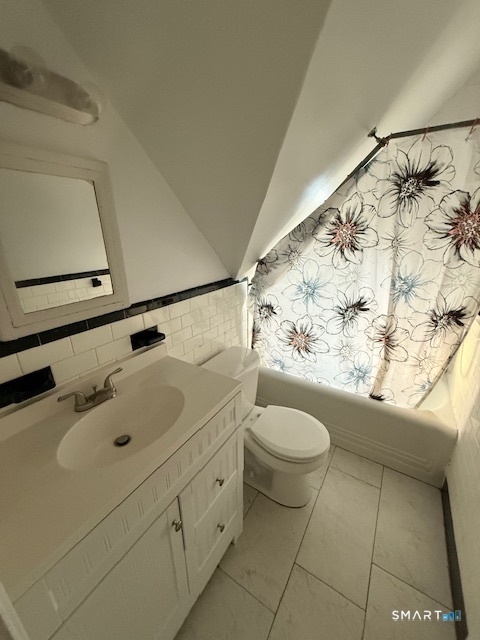 41 Alfred Street Bridgeport, CT 06605 - Photo 7 of 11 a bathroom with a sink a toilet and shower