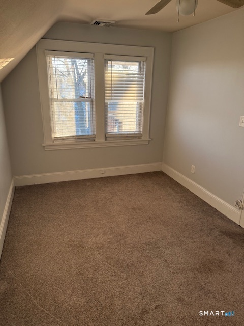 41 Alfred Street Bridgeport, CT 06605 - Photo 10 of 11 an empty room with a window
