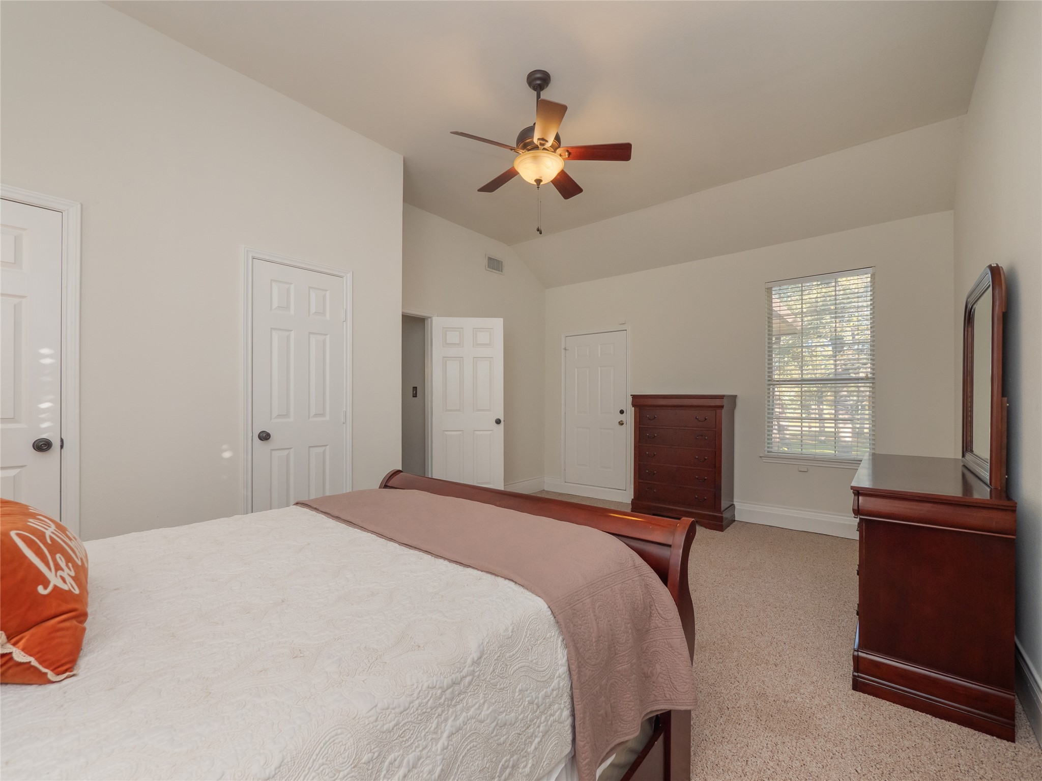 533 Arbors Circle Elgin, TX 78621 - Photo 18 of 39 a bedroom with a bed and a flat screen tv