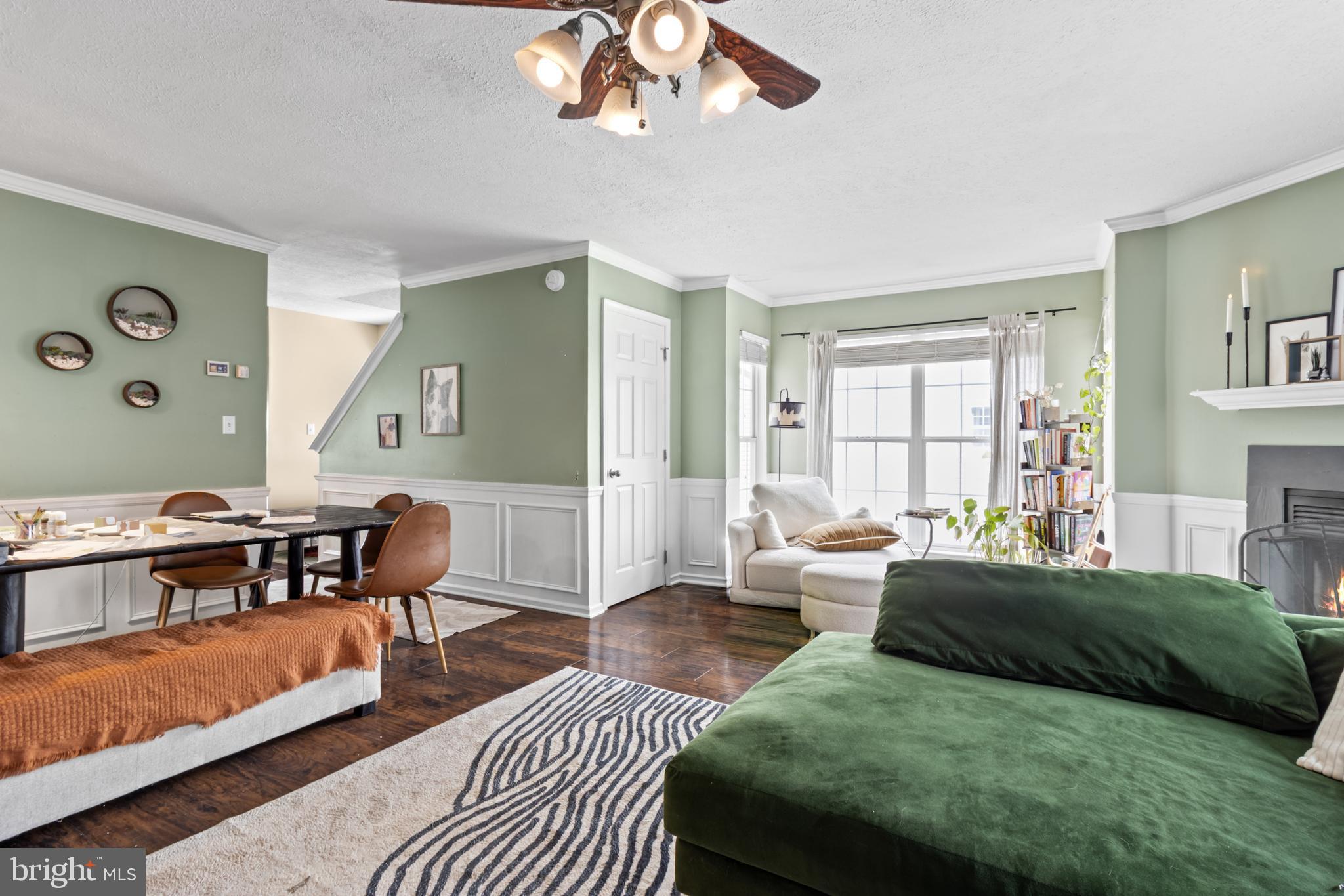 115 Balmoral Way Newark, DE 19702 - Photo 13 of 31 a spacious bedroom with a bed a couch and a chandelier