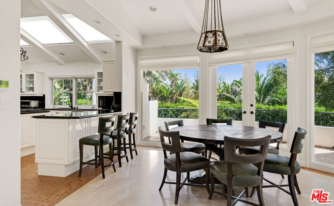 28899 Cliffside Drive Malibu, CA 90265 - Photo 13 of 53 a view of a dining room with furniture window and outside view