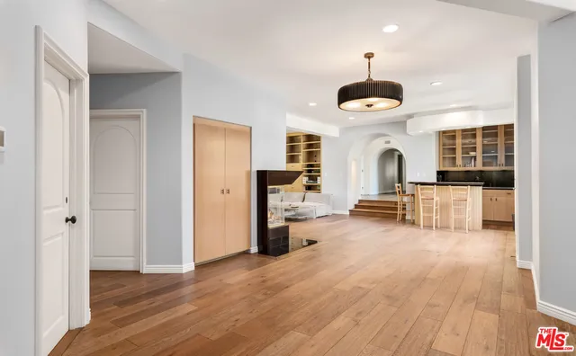 a view of a chairs and table in a patio