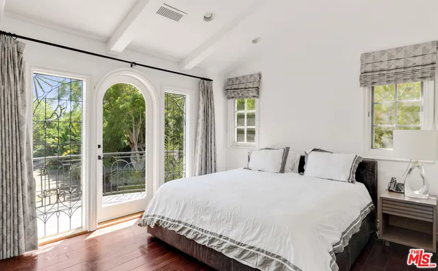 an aerial view of a house with a lake view