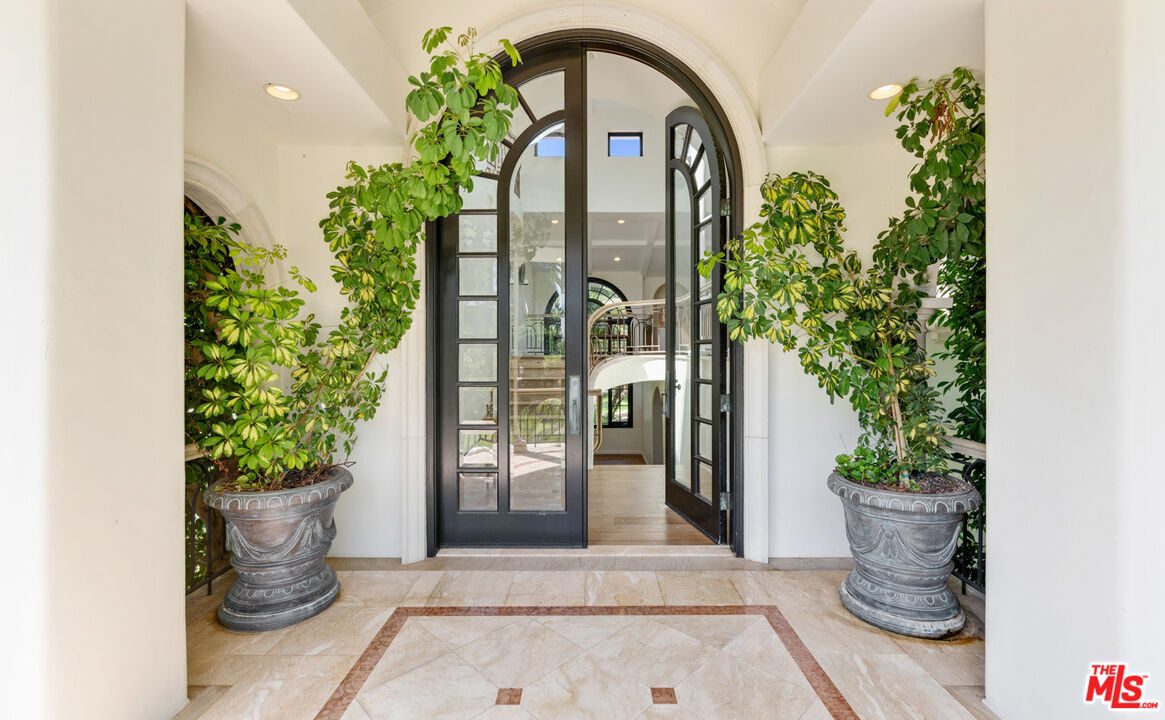 28899 Cliffside Drive Malibu, CA 90265 - Photo 5 of 53 a view of a potted plant in front of a door