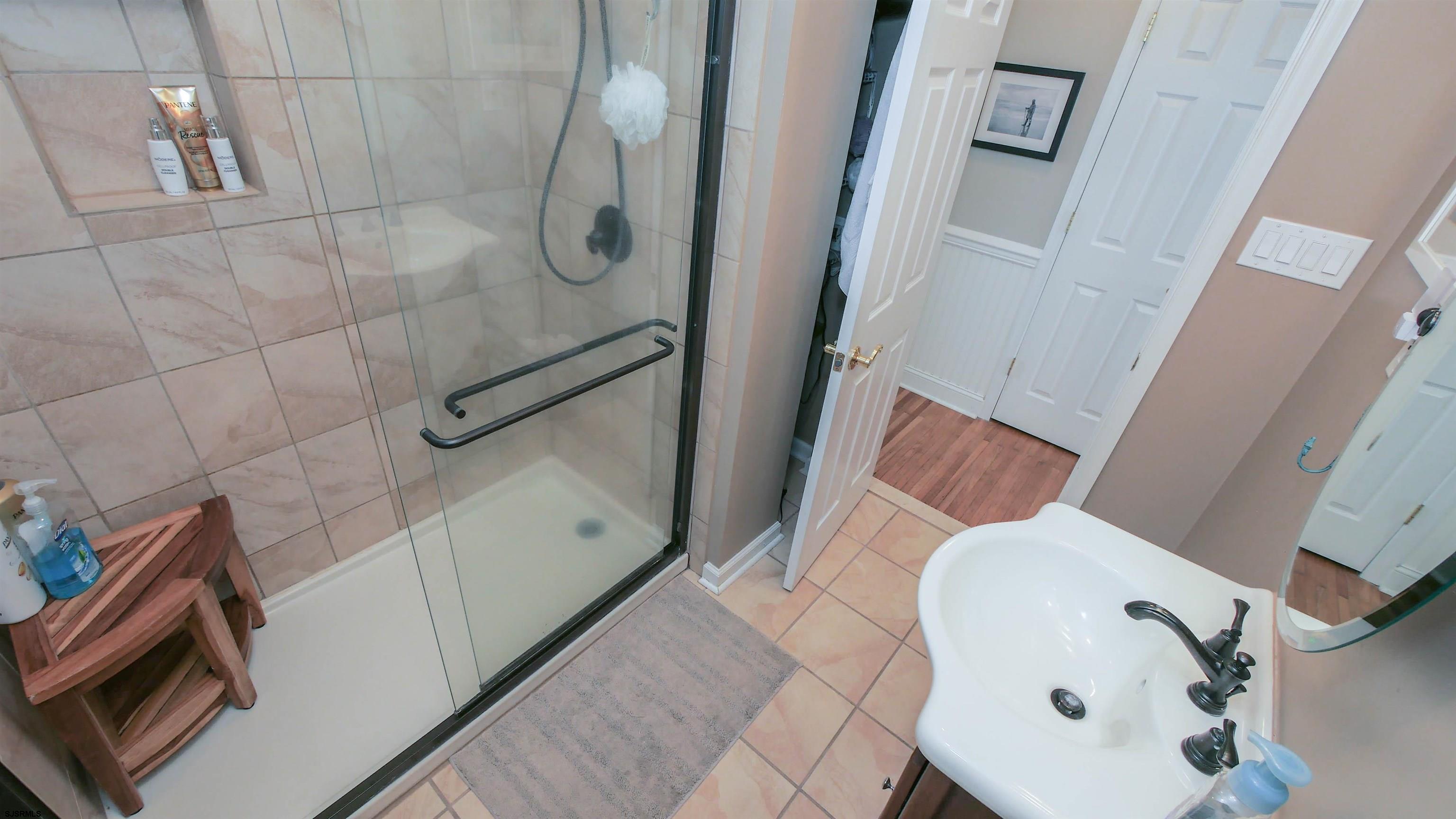 16 Spruce Road Ocean City, NJ 08226 - Photo 18 of 41 a bathroom with a bathtub and shower
