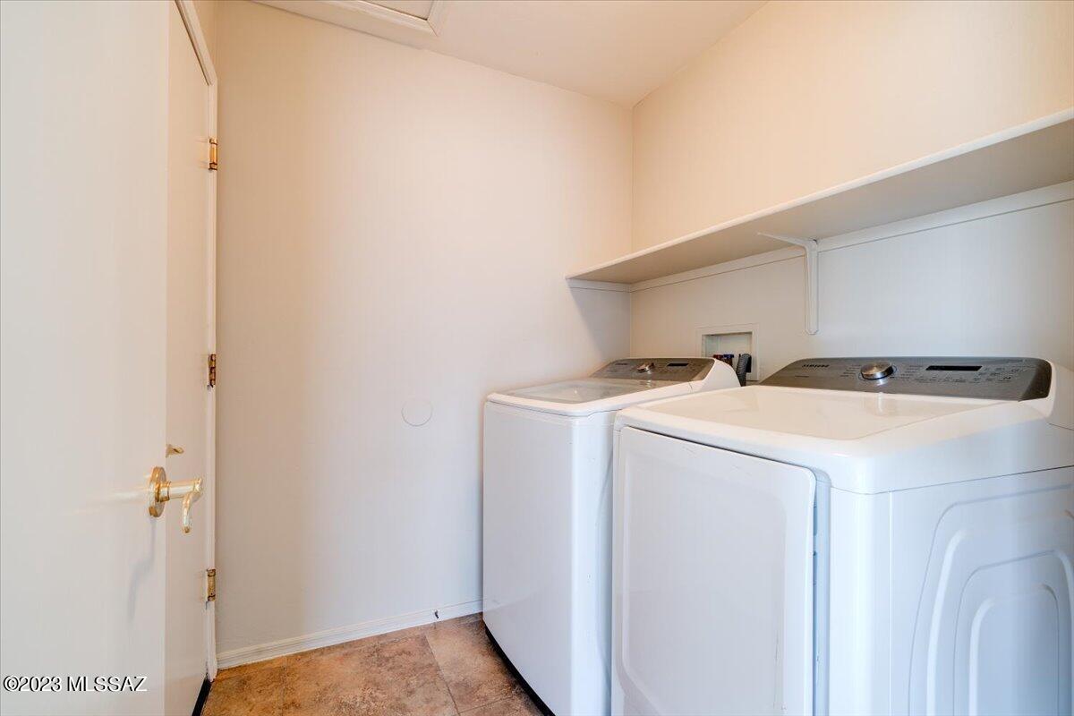 4686 South Valley Road Tucson, AZ 85714 - Photo 32 of 37 a utility room with dryer and washer