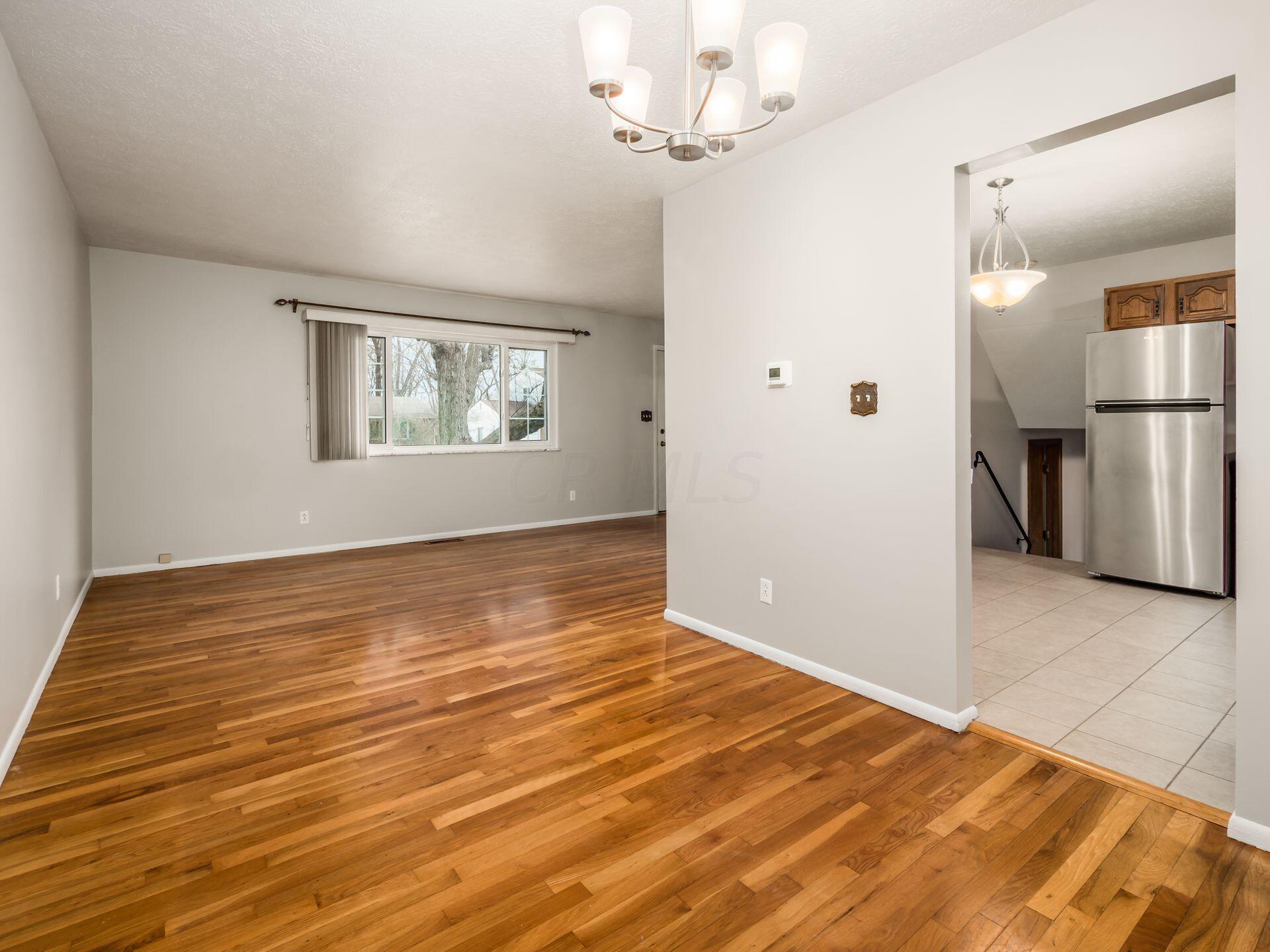 1591 Fall Brook Road Columbus, OH 43223 - Photo 5 of 32 Living and Dining Room