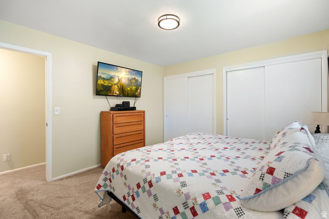 865 South 325 West Orem, UT 84058 - Photo 18 of 38 Carpeted bedroom featuring neutral-toned walls and a recessed doorway