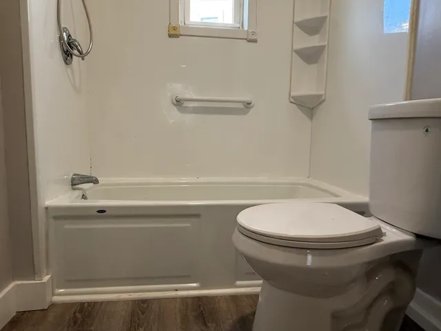 a bathroom with a toilet and a sink