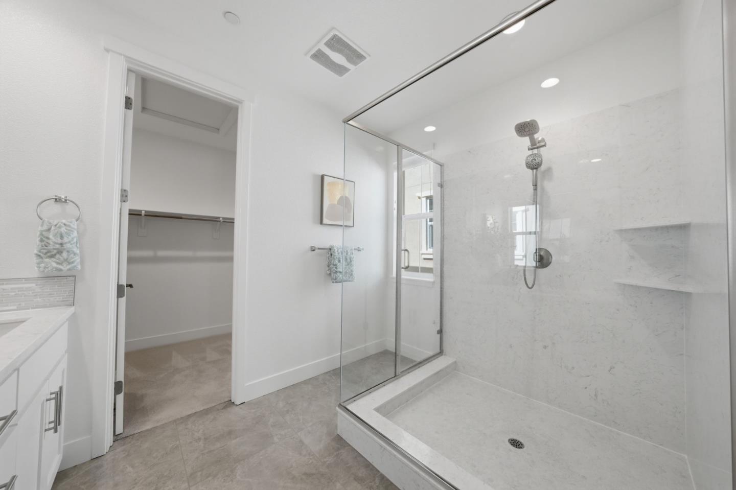 37517 Bay Crest Road Newark, CA 94560 - Photo 50 of 88 a bathroom with a shower and a glass door