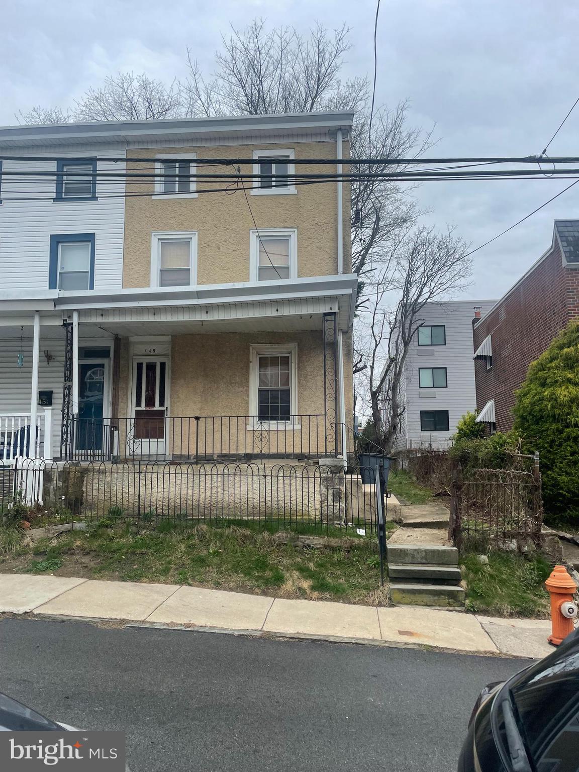 front view of a house with a street