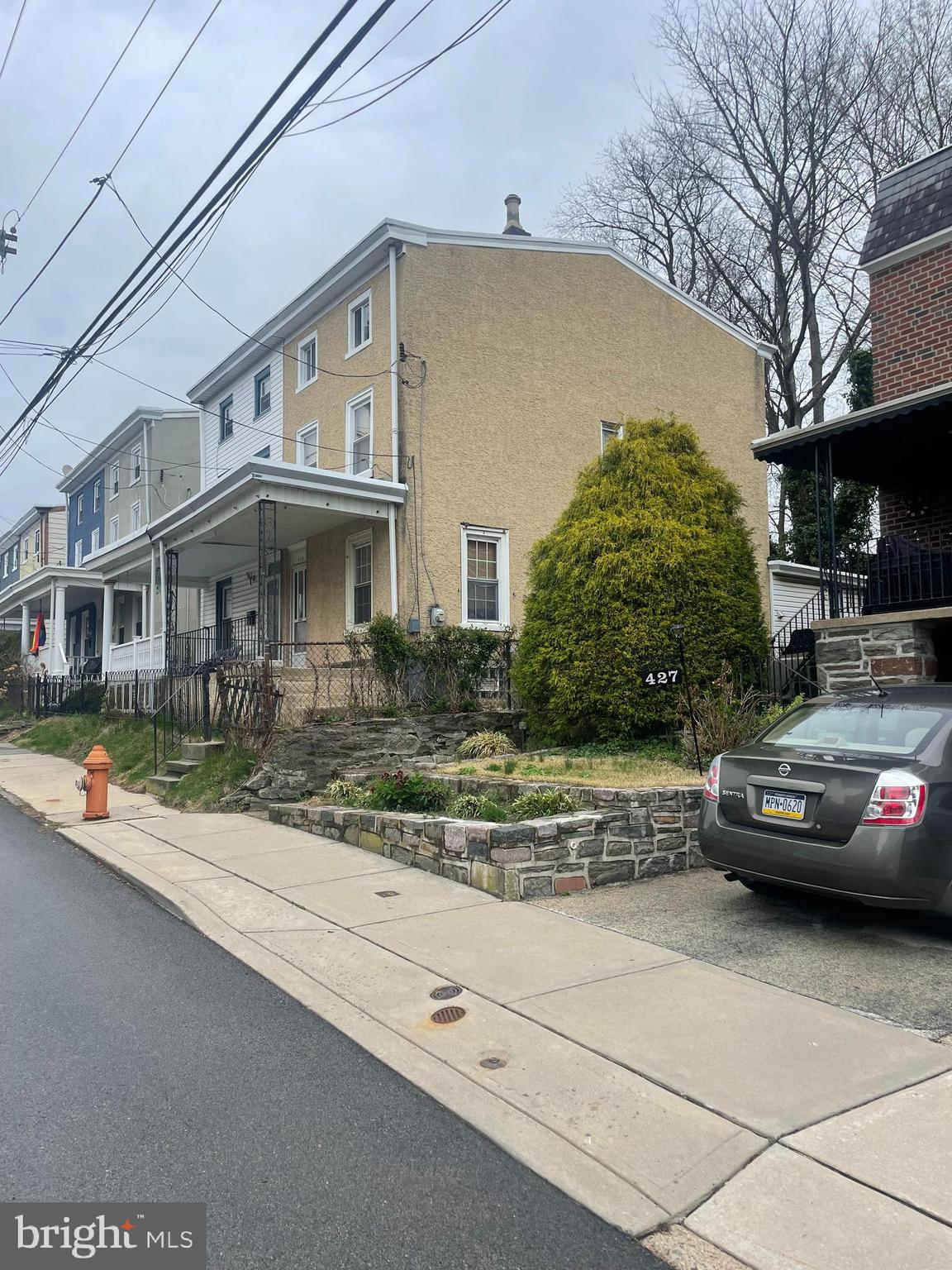449 Delmar Street Philadelphia, PA 19128 - Photo 13 of 13 a front view of a house with car parked