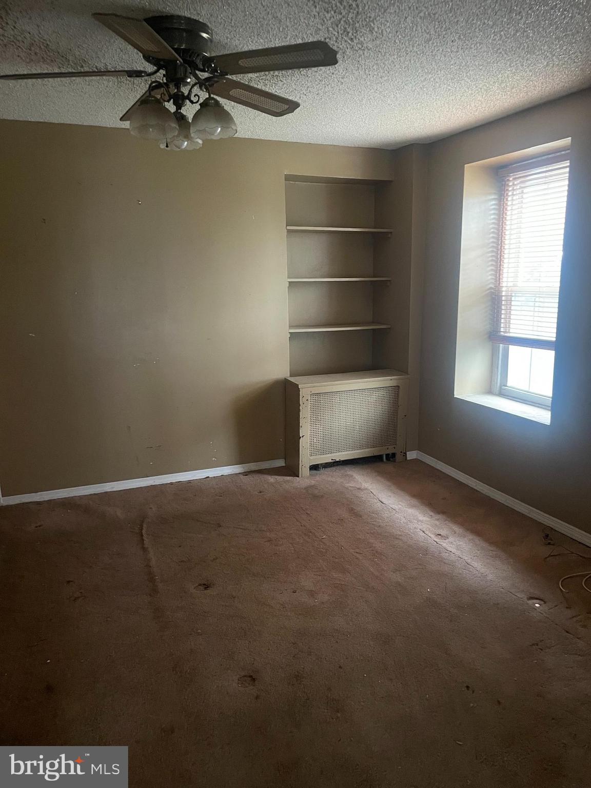 449 Delmar Street Philadelphia, PA 19128 - Photo 3 of 13 a view of an empty room with a window