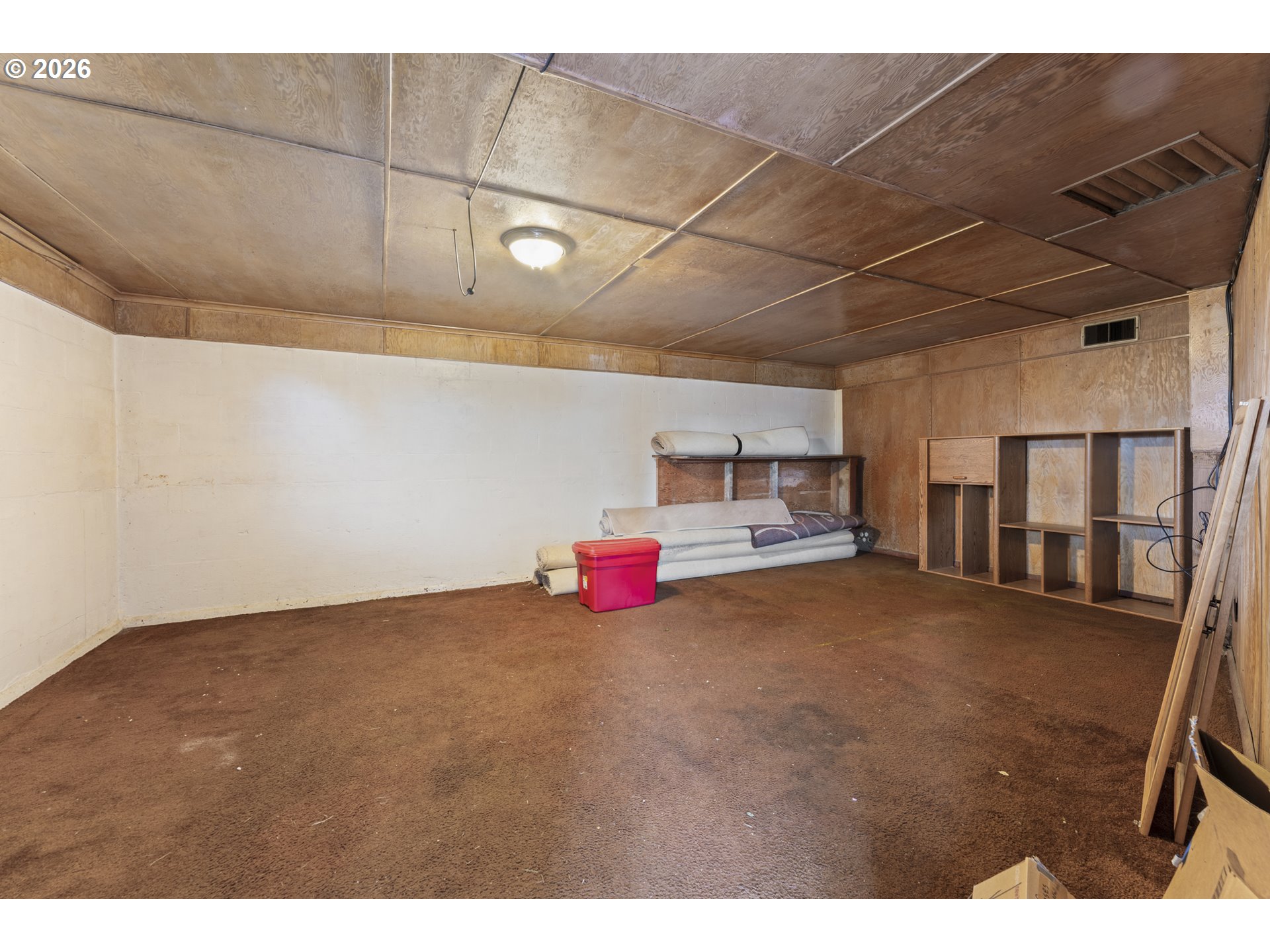 642 Clark Street North Bend, OR 97459 - Photo 24 of 29 a bedroom with furniture and natural light
