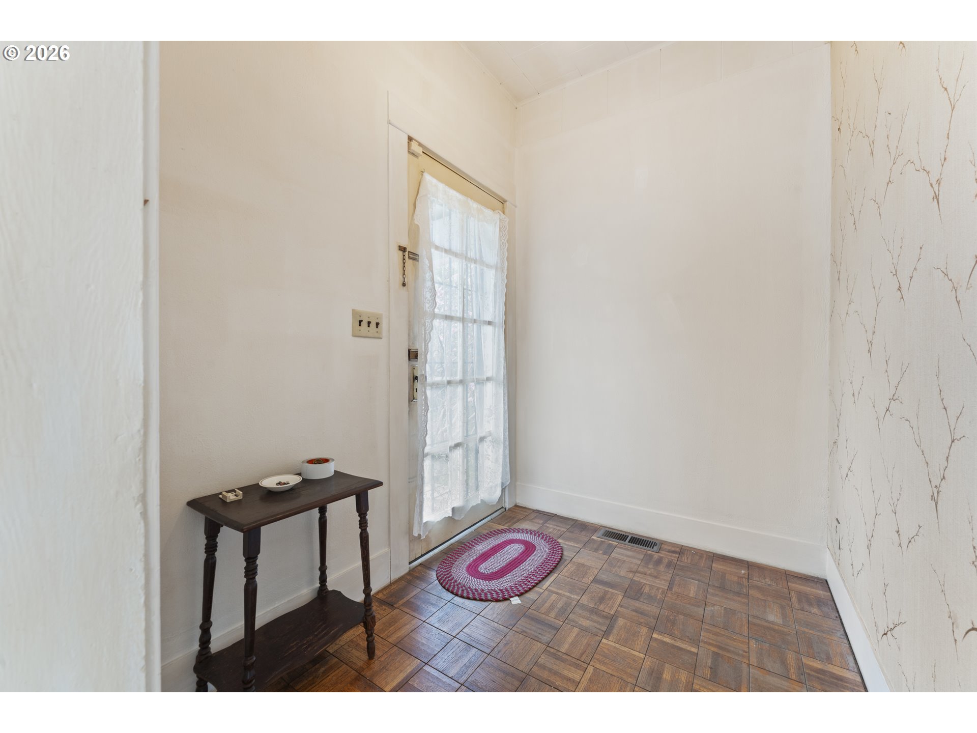 642 Clark Street North Bend, OR 97459 - Photo 4 of 29 a view of an entryway with wooden floor