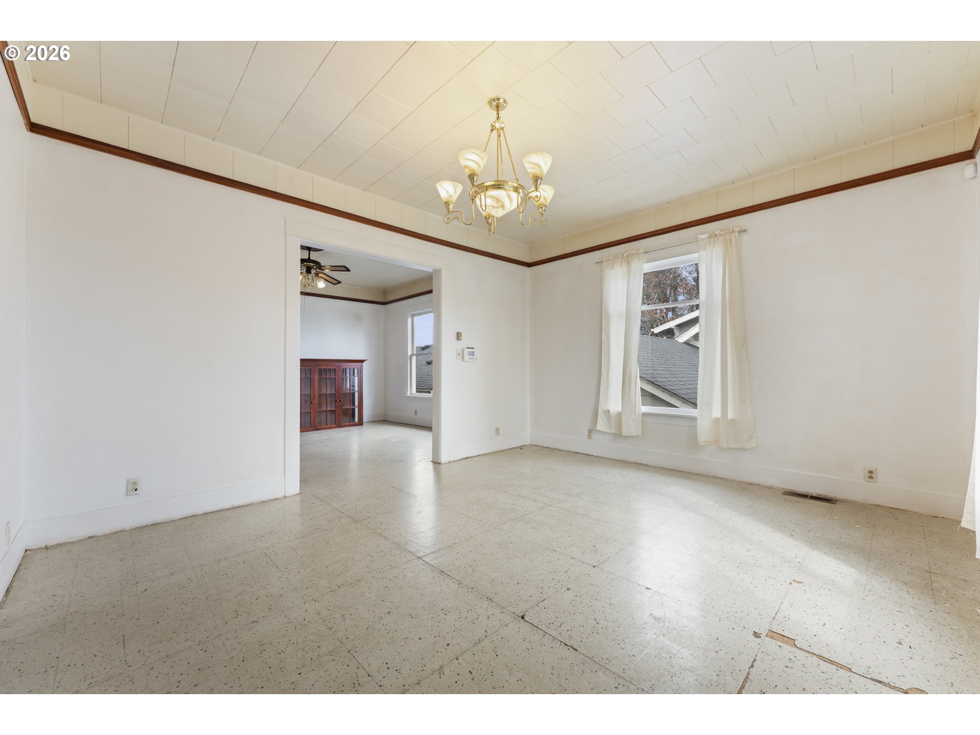 642 Clark Street North Bend, OR 97459 - Photo 7 of 29 a view of an empty room with a window